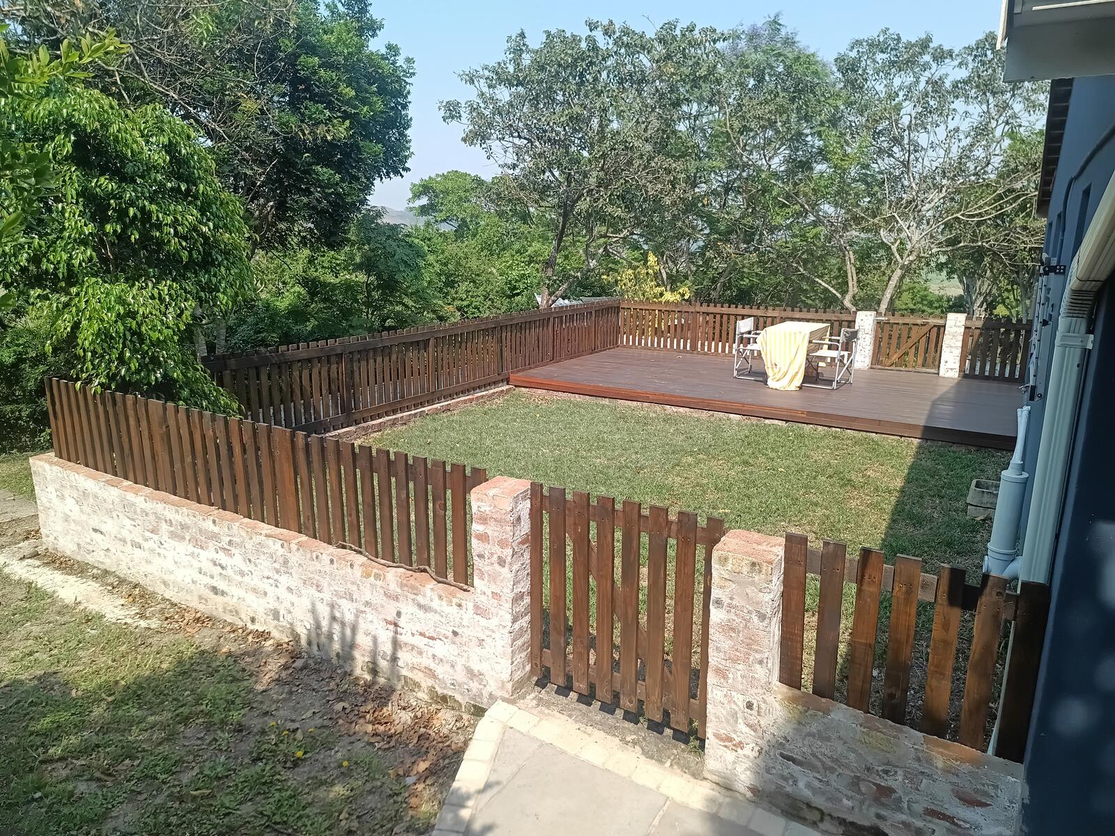 Enclosed pet-friendly garden and wooden deck